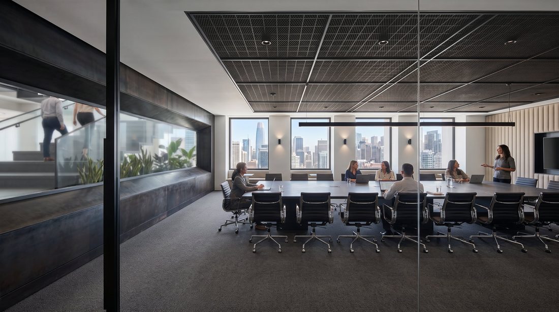 Board room with a clear glass view onto the feature staircase